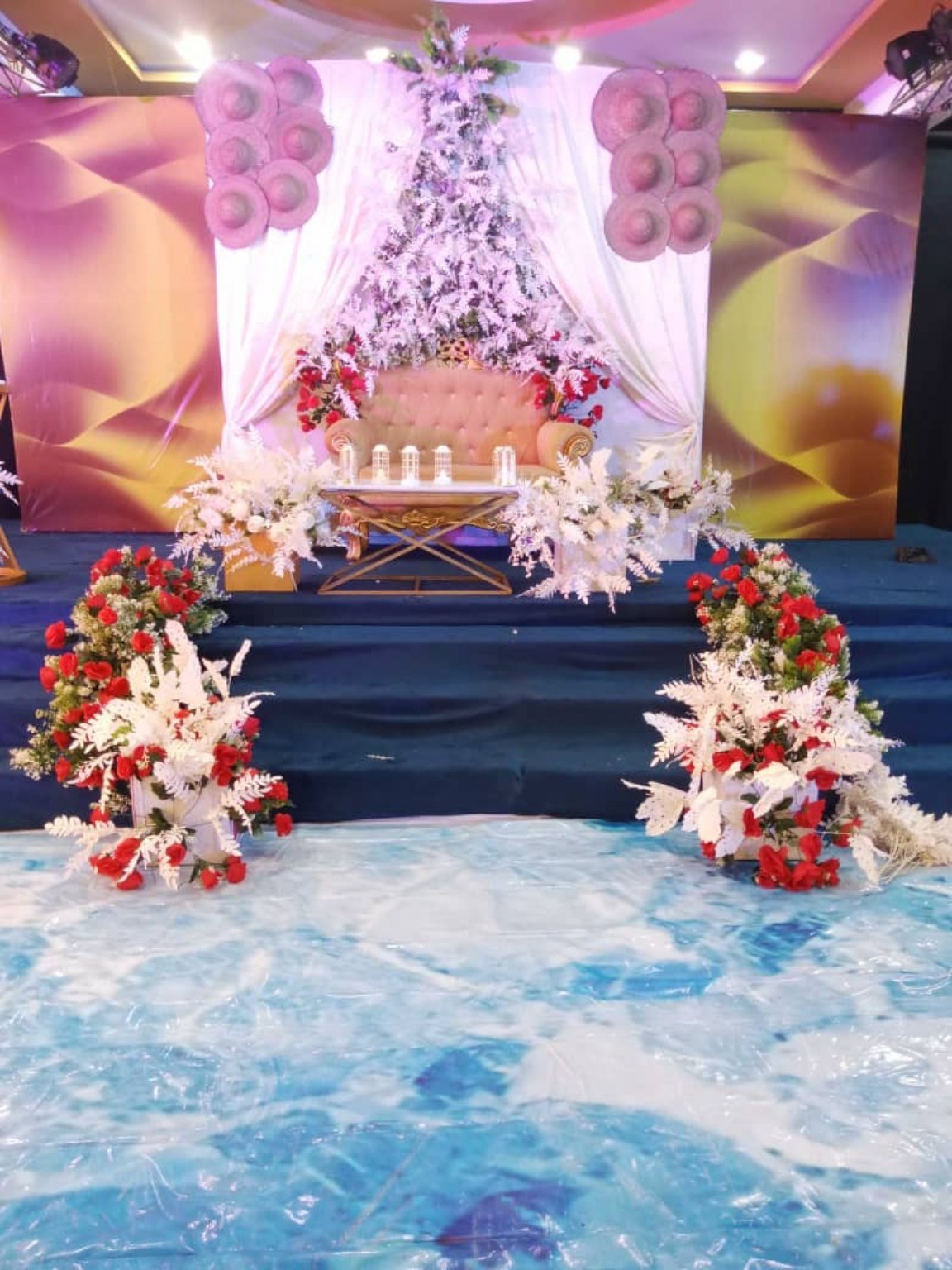 Floral stage setting at Oasis Center